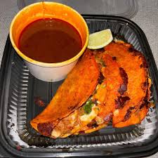 Camp Cantina signature dishes Birria TacosNashville Hot TacosBaja Fish Tacos